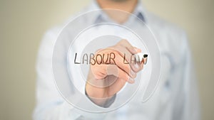 Labour Law, man writing on transparent screen