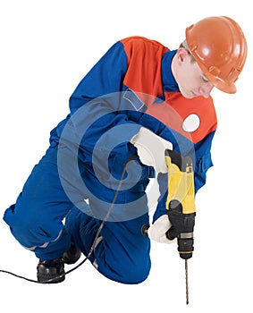 Labourer with hand drill photo