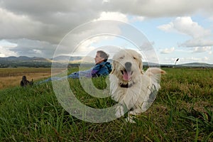 Labradoodle and owner.