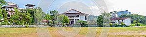 Labuduwa Siridhamma College playground and the Auditorium building with hostels on the side