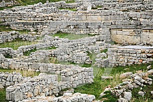 Labyrinth of remains of ancient walls on the site of a destroyed antique city