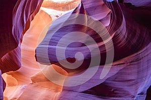 Labyrinths of natural landscape of Lower Antelope Canyon in Page Arizona with bright sandstones stacked in flaky fiery raging