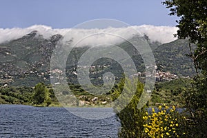 Lac de Padula (Padula lake), in the background the mountain village Oletta in the Nebbio region, Northern Corsica photo