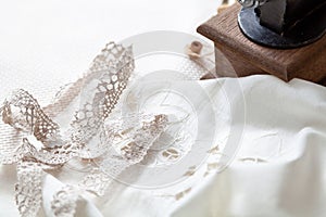 Lace braid lie on white fabric