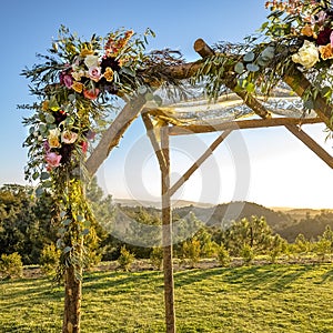 Lace canopy with wooden support and flowers