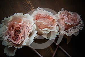 Lace flowers on dark background