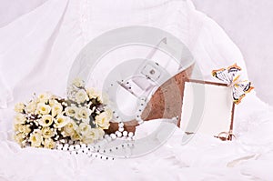 Lace with flowers, shoe and wedding rings