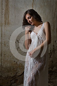 Lace nightgown in derelict building
