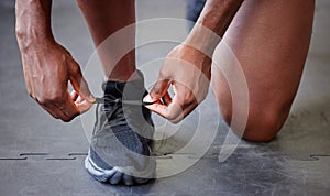 Lace shoes, sports and man running workout, cardio and wellness gym training. Closeup black man feet, runner foot and