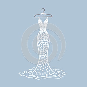 Lace wedding dress on a hanger photo