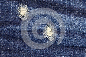 Laceration of jeans. photo