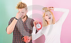 Lack of sleep. Couple sleep not enough time. Family drink morning coffee yawning faces. Couple oversleep awakening hold photo