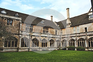 Lacock, England - March 01 2020: Shot of the cloisters and internal courtyard at Lacock Abbey