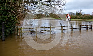 Lacock Wiltshire Uk flooded road and field