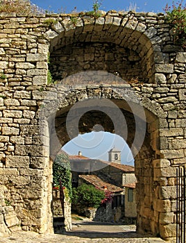 Lacoste, France, through archway