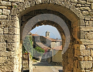 Lacoste, France, through archway photo