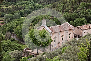 Lacoste, Vaucluse, Provence-Alpes-Cote d`Azur, France: landscape of the woods of the Luberon natural regional park with the