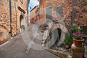 Lacoste, Vaucluse, Provence, France: ancient alley in the old to photo