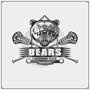 Lacrosse club emblem with bear head.