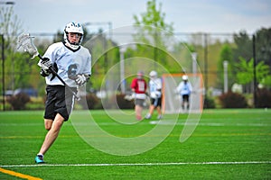 Lacrosse Player with the ball