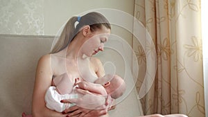 Lactation.Mother breastfeeds her baby