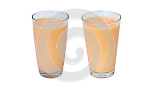 Lactic fermenting beverage color light orange sour taste in two type glass tall isolated on white background.