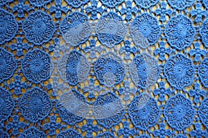 Lacy cotton fabric on wood