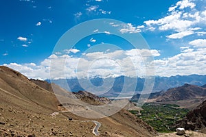 Beautiful scenic view from Between Khardung La Pass 5359m and Leh in Ladakh photo