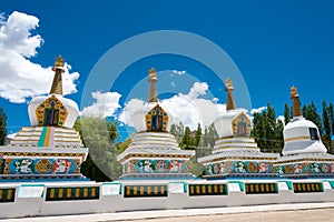 Tibetan Stupa at The Dalai Lama`s Palace JIVETSAL / His Holiness Photang in Choglamsar, Ladakh, Jammu and Kashmir, India. photo