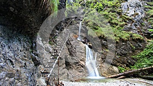 Ladder leading along the waterfall