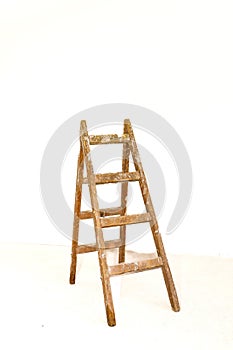 the ladder is made of wood and has an opening and closing photo