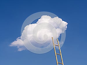 Ladder reaches the white cloud on the blue sky.
