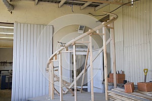Fragment of completion and docking, bent by handrails from lamellas of oak. photo