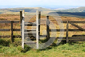 Ladder stile across fence