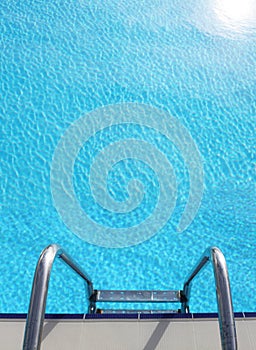 Ladder to the blue pool