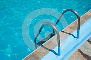 Ladder to the blue pool