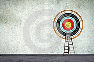 Ladder to the target, on a concrete wall. Concept of the path to the right goal. Business. Lifestyle. Abstraction