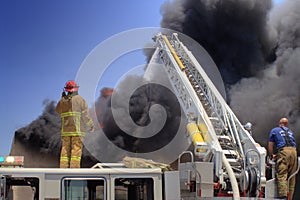 Ladder Truck puts out fire