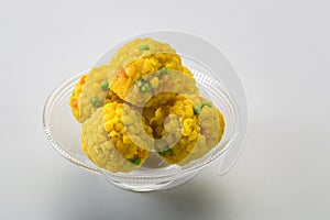 Laddu or laddoo are ball-shaped sweets popular in the Indian subcontinent.