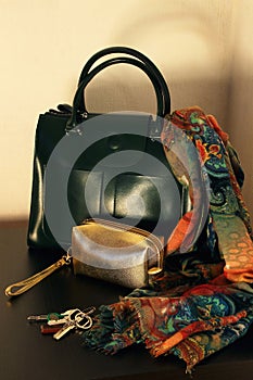 A ladies` bag with a scarf