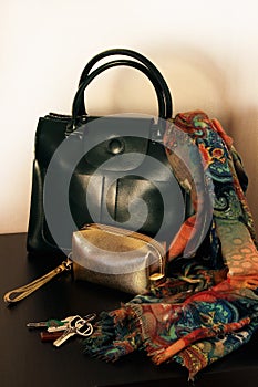 A ladies` bag with a scarf