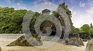 Ladies Cave on the Glen Beach, Saundersfoot, Wales at low tide; a spectacular example of an anticline photo