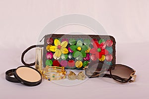 Ladies clutch purse with cosmetics and accessories