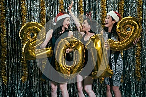 Ladies dancing with gold 2019 new year balloon