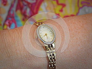 Ladies gold wristwatch jewellery timepiece