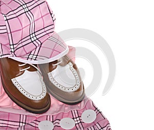 Ladies golf shoes and plaid clothing