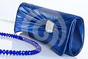 Ladies' handbag and beads photo