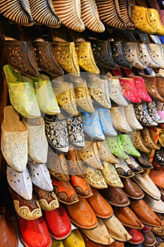 Ladies leather slippers on shop rack