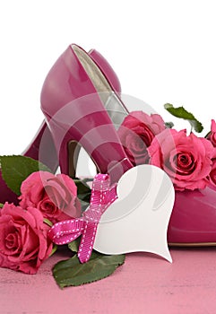 Ladies pink high heel stiletto shoes and roses