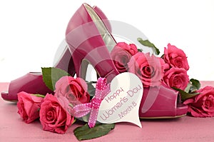 Ladies pink high heel stiletto shoes and roses